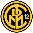 Escudo anterior de C.D.E. Internacional de Móstoles