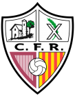 Escudo de C.F. Riuprimer B